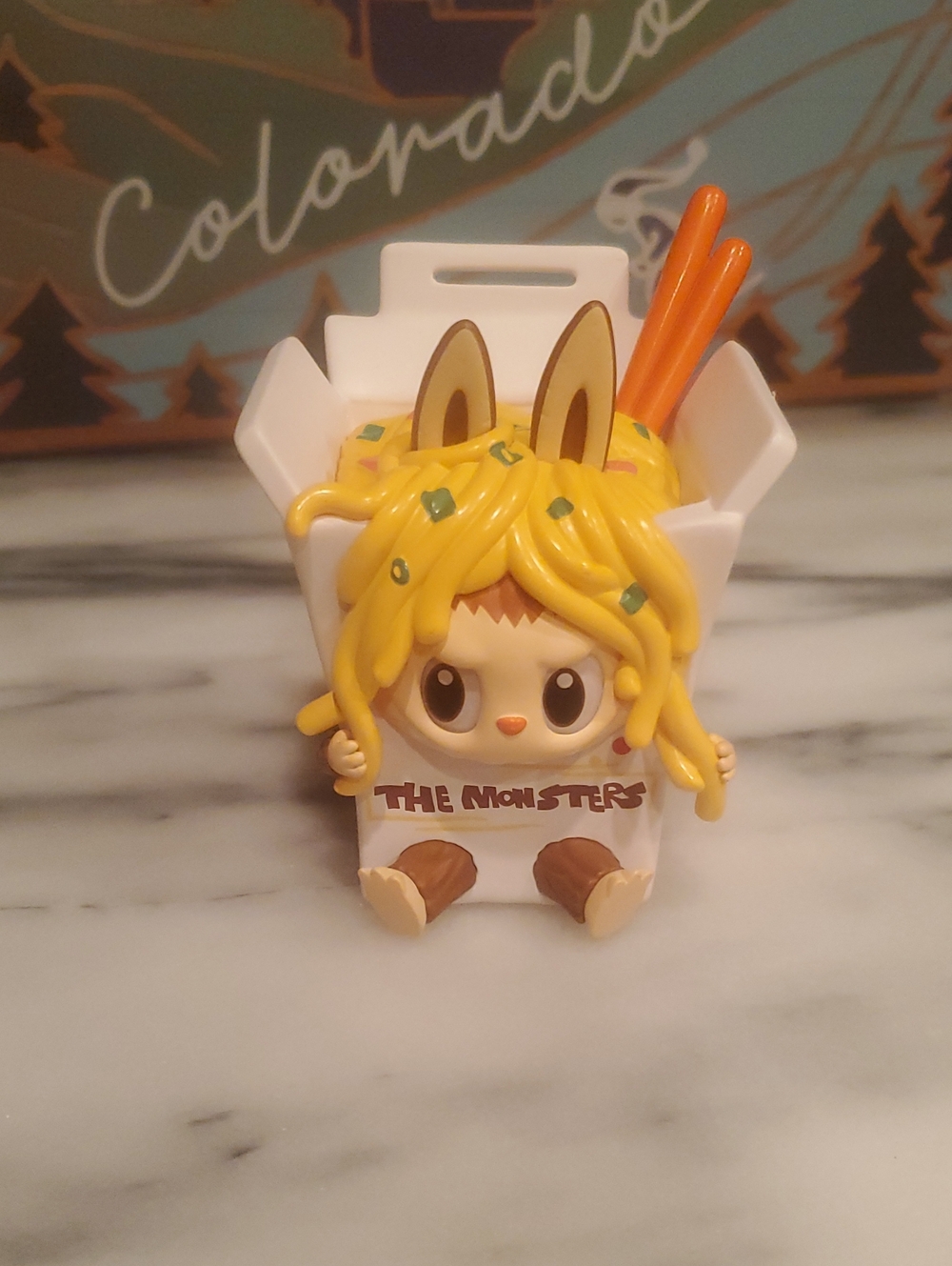 Pop Mart Labubu The Monsters Figurine with Yellow Hair and Orange Chopsticks